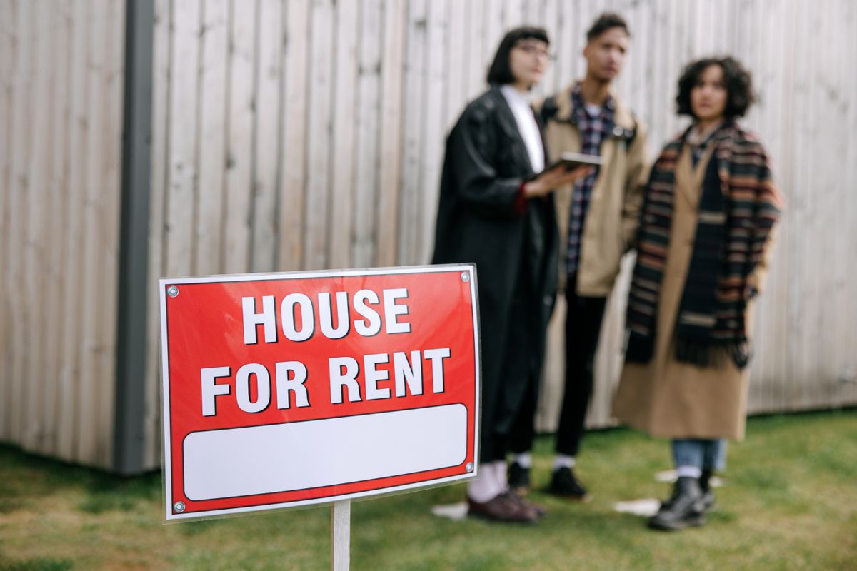 Couple reviewing paperwork during a rental lease signing
